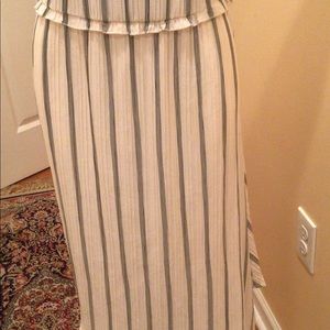 Pleated asymmetrical skirt
